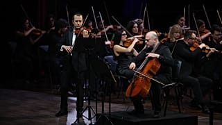 Armenian violinist Haik Kazazyan performs alongside cellist Alexander Chaushian during the final day of the inaugural Classic Violin Olympus in Dubai