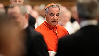Cardinal Angelo Becciu attends the consistory inside St Peter's Basilica, at the Vatican, 27 August 2022