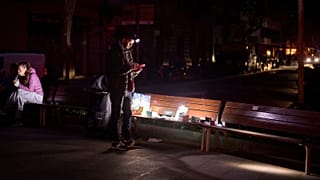 A man sells battery-powered radios and torches on a Barcelona street during the blackout in Barcelona, Spain, 29 April, 2025. 