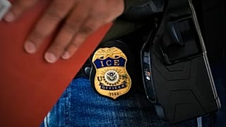 A deportation officer with ICE conducts a briefing before an early morning operation, 17 December, 2024