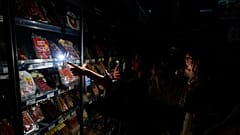 People buy food at a supermarket during a massive power outage in Pamplona, 28 April, 2025