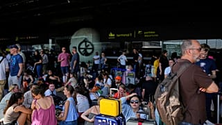 Thousands of travellers were left stranded, with some spending the night on airport floors.