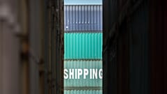 FILE: A stack of China Shipping containers at the Port of Savannah in Savannah, GA, 5 July 2018