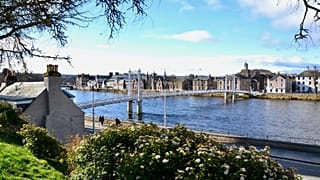 The Greig Street Bridge appears over River Ness in Inverness, Scotland.