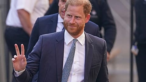 Prince Harry gestures as he arrives at the High Court in London, England, Tuesday, April 8, 2025. (AP Photo/Alberto Pezzali)