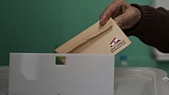 A Lebanese man casts his ballot at a polling station during municipal elections in the southern suburbs of Beirut, 4 May 2025