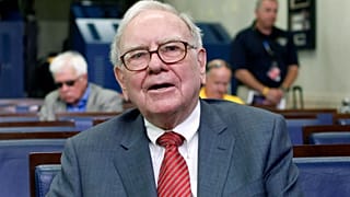 In this Monday, July 18, 2011, file photo, Warren Buffett is interviewed in the White House Briefing Room in Washington, following a meeting with President Barack Obama.