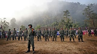 Soldiers with the Karen National Army stand in formation in New Manerplaw, 31 January, 2006