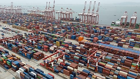 Shipping containers ready for transport at the Guangzhou Port in the Nansha district in southern China's Guangdong province, 17 April, 2025