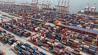 Shipping containers are seen ready for transport at the Guangzhou Port in the Nansha district in southern China's Guangdong province, April 17, 2025.