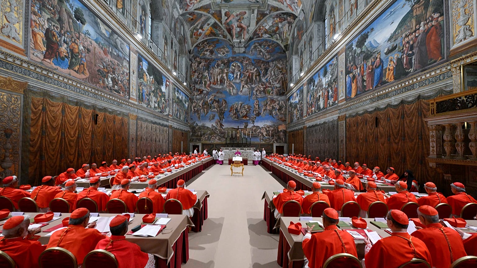Cardinals attend the first day of the conclave to elect the successor of late Pope Francis inside the Sistine Chapel at the Vatican, 7 May 2025