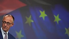 Germany's Chancellor Friedrich Merz addresses the media at EU headquarters in Brussels, 9 May 2025