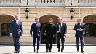 Four European leaders and Ukrainian President Volodymyr Zelenskyy walk at the Presidential Palace in Kyiv, 10 May 2025