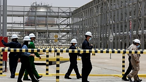 Saudi Aramco engineers escort reporters on a tour of the Hawiyah Natural Gas Liquids Recovery Plant,in Hawiyah, in the Eastern Province of Saudi Arabia, Monday, June 28, 2021.