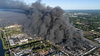 A fire burns from a vast shopping complex in Warsaw, 12 May, 2024