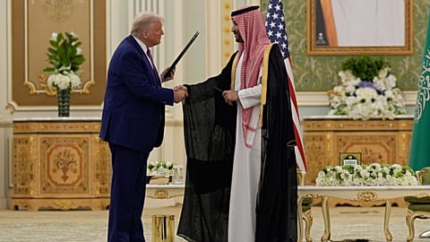 President Donald Trump and Saudi Crown Prince Mohammed bin Salman shake hands after exchanging documents during a signing ceremony at the Royal Palace in Riyadh, Saudi Arabia.