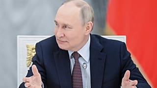 Russian President Vladimir Putin speaks at a meeting of the board of trustees of Bolshoi and Mariinsky theatres at the Kremlin Senate in Moscow, Russia, Tuesday, May 13, 2025.
