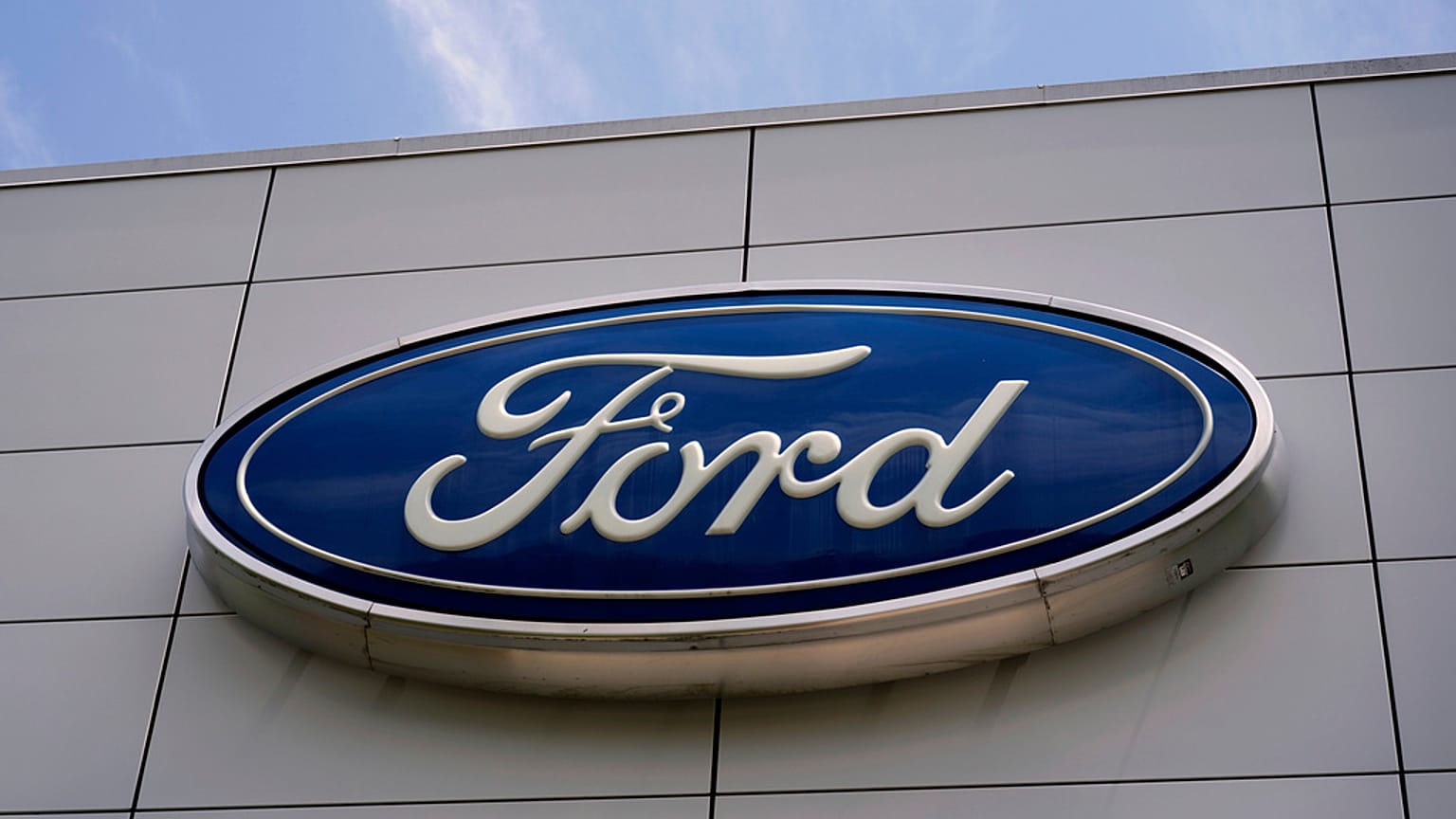 The Ford logo is seen above the entrance to the Ford Motor Company Kentucky Truck Plant, Wednesday, April 30, 2025, in Louisville, Ky