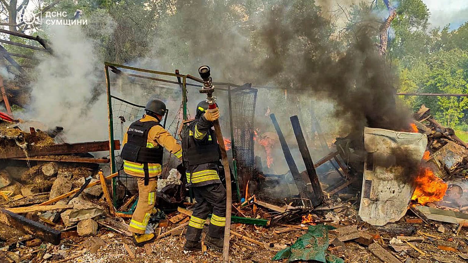 Provided by the Ukrainian Emergency Service - firefighters extinguish a fire after Russia's air raid in the village of Bilopillya in the Sumy region, Ukraine, 14.05.2025