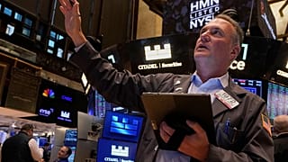 Trader Jonathan Corpina works on the floor of the New York Stock Exchange, Wednesday, May 14, 2025.
