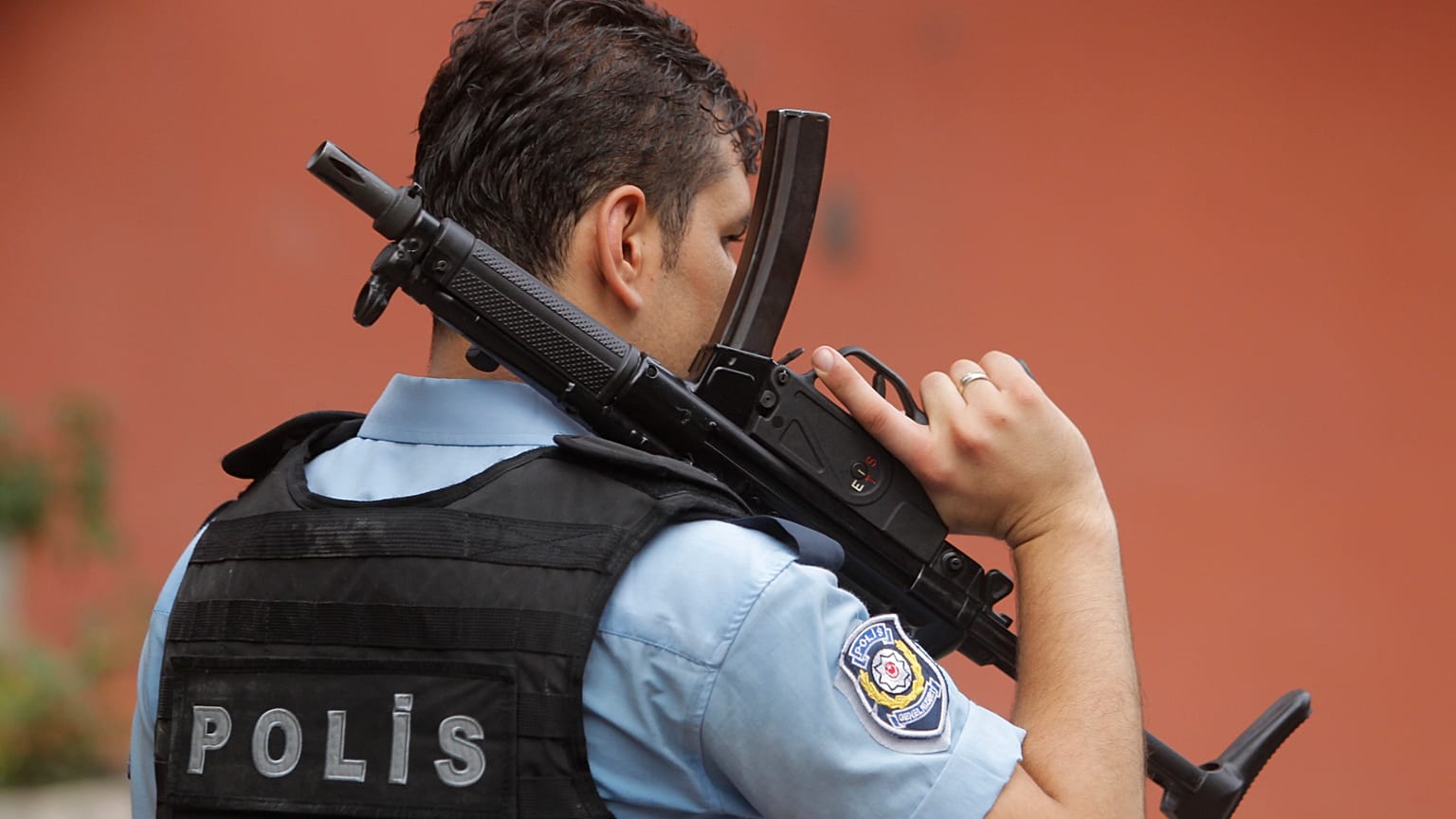 FILE: An armed Turkish police officer secures a road in Istanbul, 10 August 2015