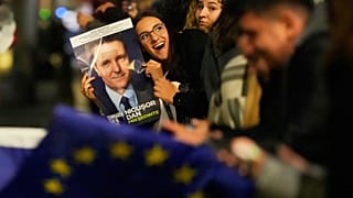 Supporters of Presidential candidate Nicușor Dan celebrate on the street after polls closed in the country's presidential runoff in Bucharest, 18 May, 2025
