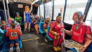 Interior view of The Bus by Red Grooms during a press preview at the Fenix Migration Museum in Rotterdam, Netherlands, Wednesday, May 14, 2025.