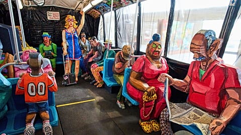 Interior view of The Bus by Red Grooms during a press preview at the Fenix Migration Museum in Rotterdam, Netherlands, Wednesday, May 14, 2025.