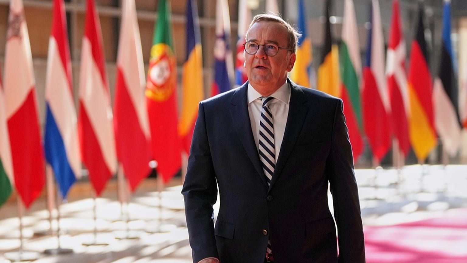 Germany's Defense Minister Boris Pistorius speaks with the media as he arrives for a meeting of EU defense ministers at the European Council building in Brussels, May 2025. 
