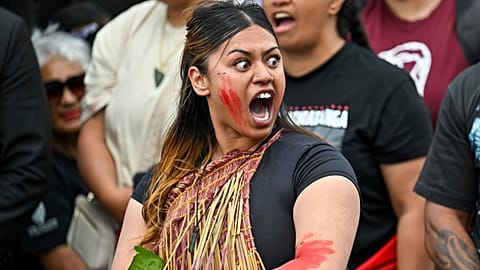 FILE PHOTO - Indigenous Māori react outside New Zealand's parliament to protest against a proposed law, in Wellington, New Zealand, Tuesday, Nov. 19, 2024. 