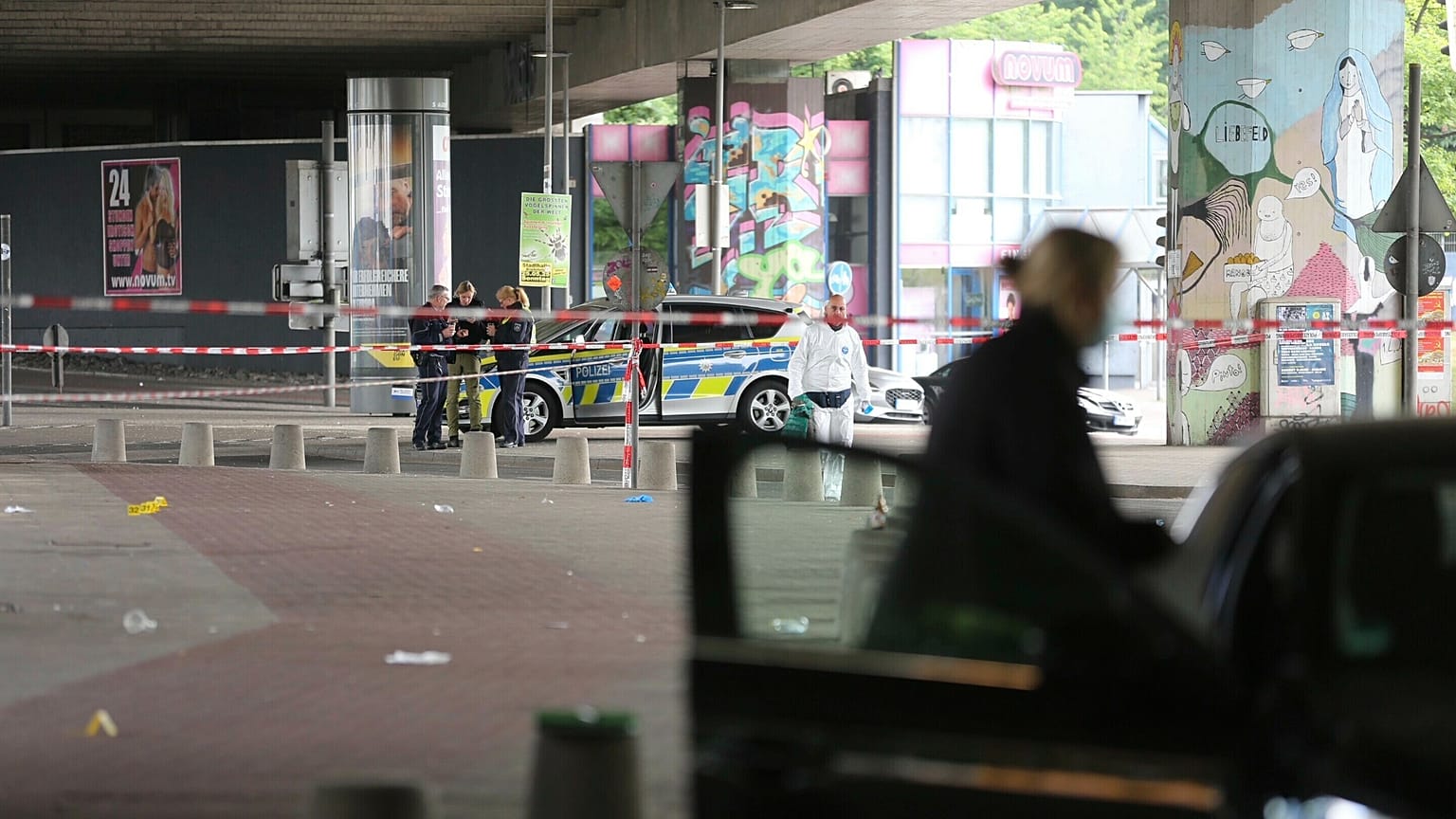 Police and forensic investigators on the scene following an attack in the western city of Bielefeld, 18 May, 2025