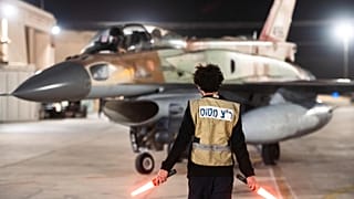 FILE - In this photo provided by the Israeli army, armed Israeli Air Force planes depart from an unknown location to attack Iran on Oct. 26, 2024. 