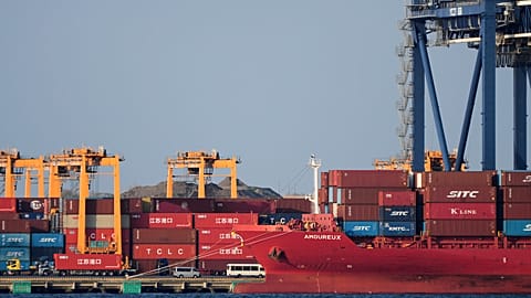 A container ship is docked at a cargo terminal in Tokyo, on April 9, 2025.