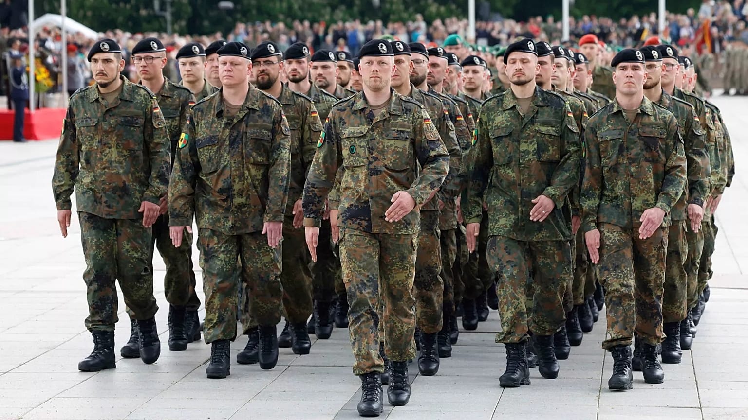 German soldiers march at a formal inauguration of a German brigade for NATO's eastern flank in Vilnius, 22 May 2025