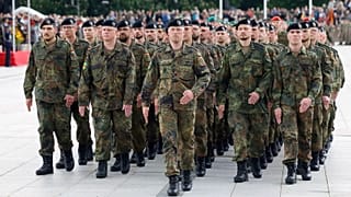 German soldiers march at a formal inauguration of a German brigade for NATO's eastern flank in Vilnius, 22 May 2025