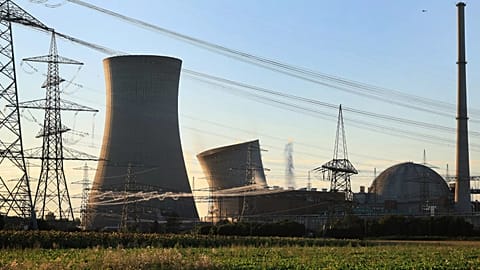 The first cooling tower of the decommissioned nuclear power plant collapses during a controlled demolition in Grafenrheinfeld, 16 August 2024