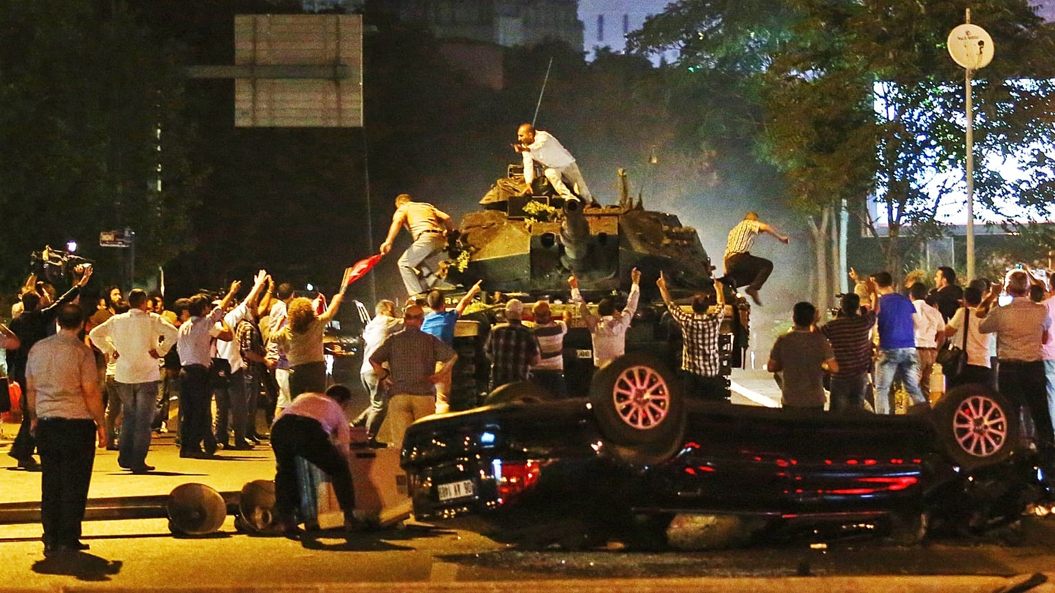 Tanks move into position as people attempt to stop them during the coup attempt in Ankara, 16 July, 2016
