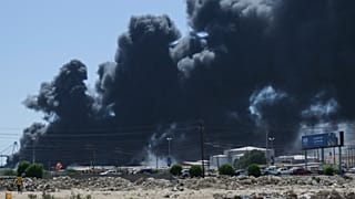 Smoke billows after drone strikes by the paramilitary Rapid Support Forces (RSF) targeted Port Sudan, Sudan, on 6 May, 2025.