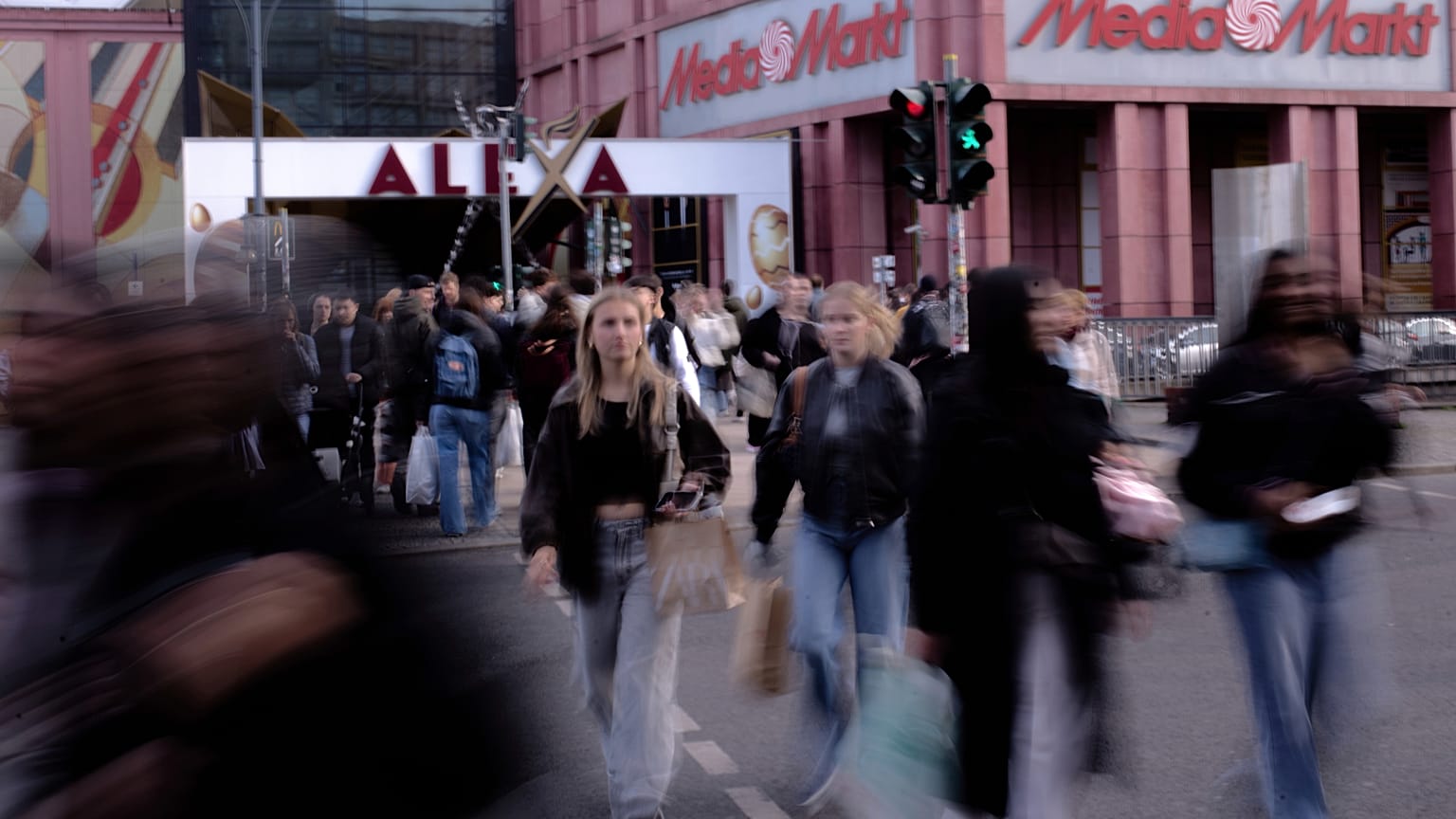 German shoppers stroll through a city street