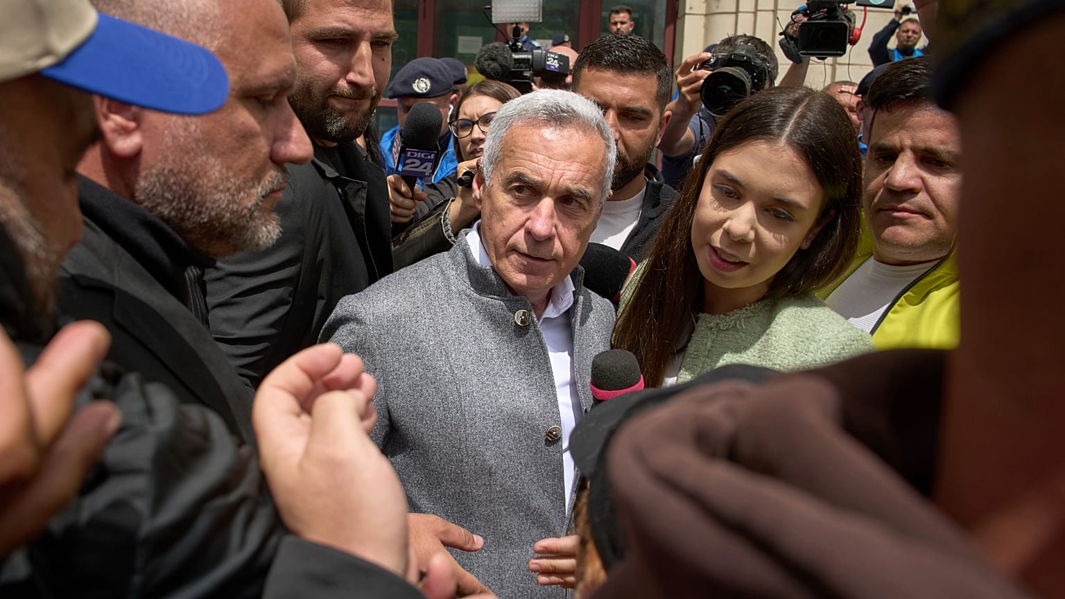 Călin Georgescu leaves a prosecutor's office in Bucharest, 27 May, 2025