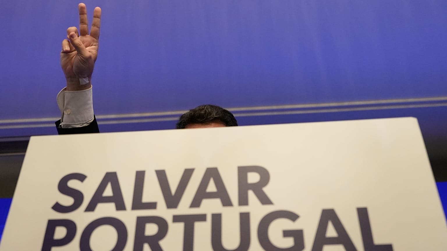 Chega leader Andre Ventura gestures while addressing media and his supporters, following Portugal's general election, in Lisbon, 19 May 2025