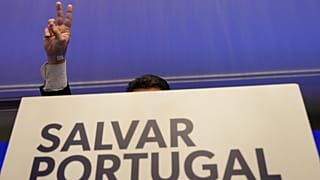 Chega leader Andre Ventura gestures while addressing media and his supporters, following Portugal's general election, in Lisbon, 19 May 2025