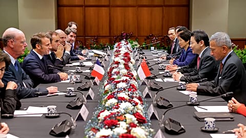 French President Emmanuel Macron with his cabinet meeting Singapore's Prime Minister Lawrence Wong and government officials in Singapore, 30 May 2025