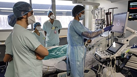 Medical staff care for a COVID-19 patient in the intensive care unit of the Strasbourg University Hospital, eastern France. 13 January 2025.