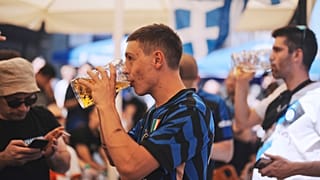 An Inter fan with a "Maß", the traditional measure of Munich lager. 