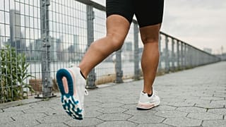 A jogger is shown from behind.