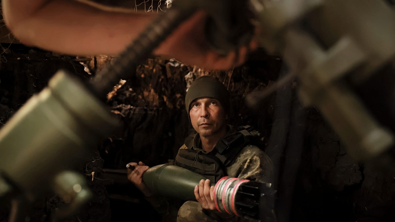 FILE: A Ukrainian soldier fires a 120mm mortar towards Russian army positions near Chasiv Yar, Donetsk region, 27 May 2025