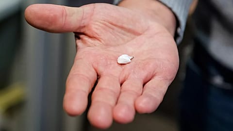 Kris Verborgh, chief police inspector of the Brussels Morolles neighbourhood, shows a package of crack cocaine on Monday, Jan. 9, 2023.