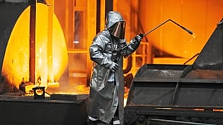 A steel worker is seen during a visit of EU Commissioner for Prosperity and Industrial Strategy Stephane Sejourne at the Thyssenkrupp steelworks in Duisburg, Germany, after th
