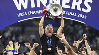 PSG's manager Luis Enrique lifts the Champions League trophy in the 30.06.2025 final in Munich after beating Inter Milan 5-0